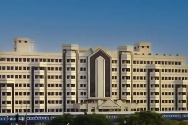VIT Vellore campus with iconic architecture, landscaped surroundings, and academic buildings.