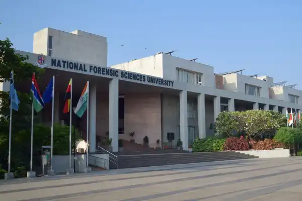Campus view of National Forensic Sciences University with modern labs and academic buildings focused on forensic studies.
